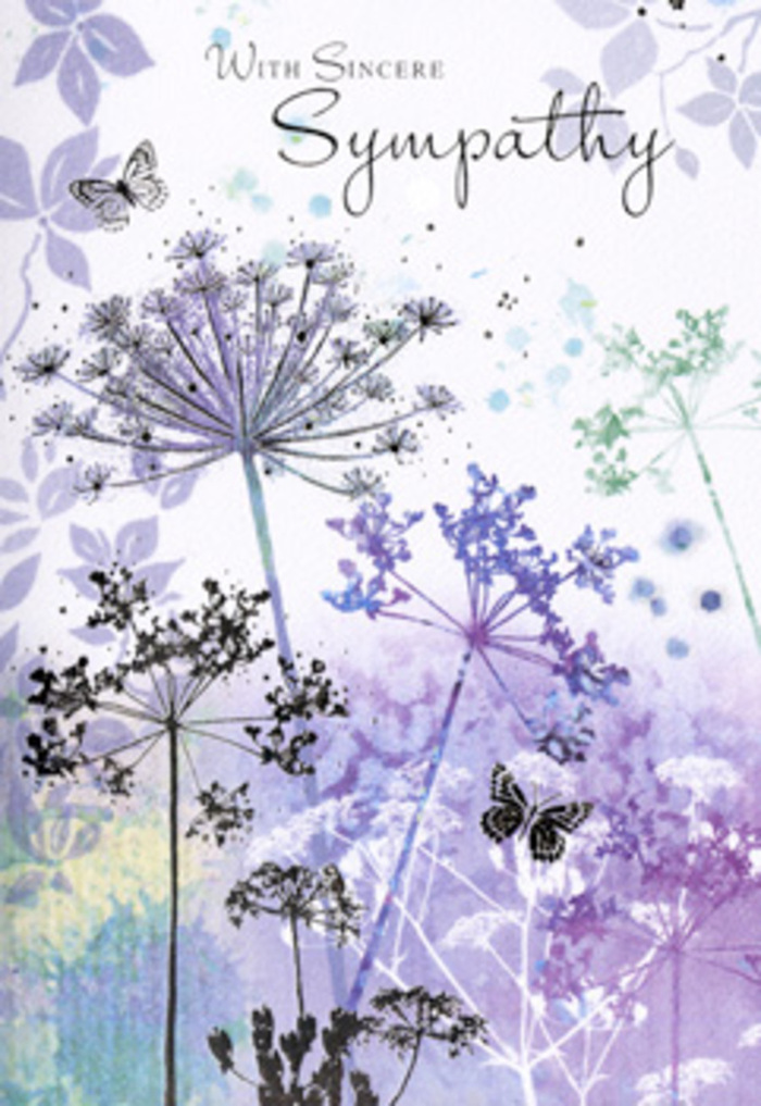 There is a calm, meditative quality to this sympathy card's illustration, reminiscent of pausing beside the Cray River on a still afternoon in St Mary Cray. The design centres on a cluster of tall, fine stems, painted in subtle shades of blue-green and soft grey, reaching up from a base of misted colour. Atop each stem sit lacy umbellifer flower heads, their many tiny segments fanning out like delicate fireworks held in slow motion. These floral crowns are coloured in layered tones of soft lavender, dusky lilac, and cool indigo, each hue gently bleeding into the next in true watercolour fashion. Details are suggested with fine, feathery strokes, giving the blooms a gossamer, almost weightless appearance, as though a breeze could move them with the slightest touch. Behind the flowers lies a backdrop of blended purples and silvery greens, with no distinct horizon line, just a quiet haze suggestive of distant fields and open sky beyond the rooftops and gardens of St Mary Cray. A pair of near-transparent butterflies hovers above and between the blooms, their wings outlined so softly they seem almost like memories taking shape. The overall impression is soothing and reflective, with light that feels diffuse and gentle, rather than direct or harsh. As a local florist accustomed to helping families choose the right condolence card to accompany their funeral flowers, I recognise how this design speaks in a language of nature and stillness. It offers a comforting space for grief, hinting that, like wildflowers returning each season, love and remembrance endure quietly over time.